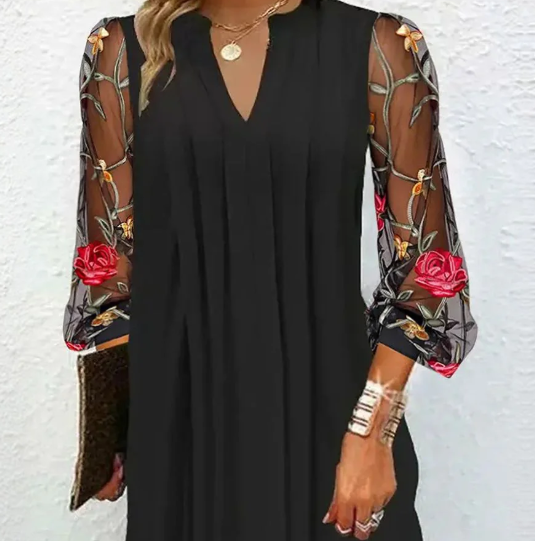Falado – Elegante mini-jurk met V-hals en transparante mouwen