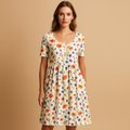Luchtige midi-jurk met zomerse prints voor dames | Janne